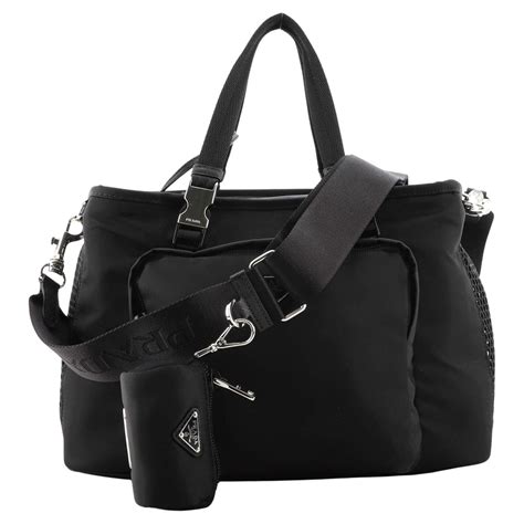 prada pet|Prada dog carrier.